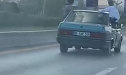 ankara’da araçtan sarkan iki kişi trafikte tehlike saçtı