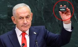 Netanyahu protestoların ortasında çağrı cihazı göstererek tehdit etti!