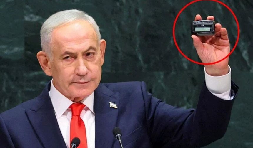 Netanyahu protestoların ortasında çağrı cihazı göstererek tehdit etti!